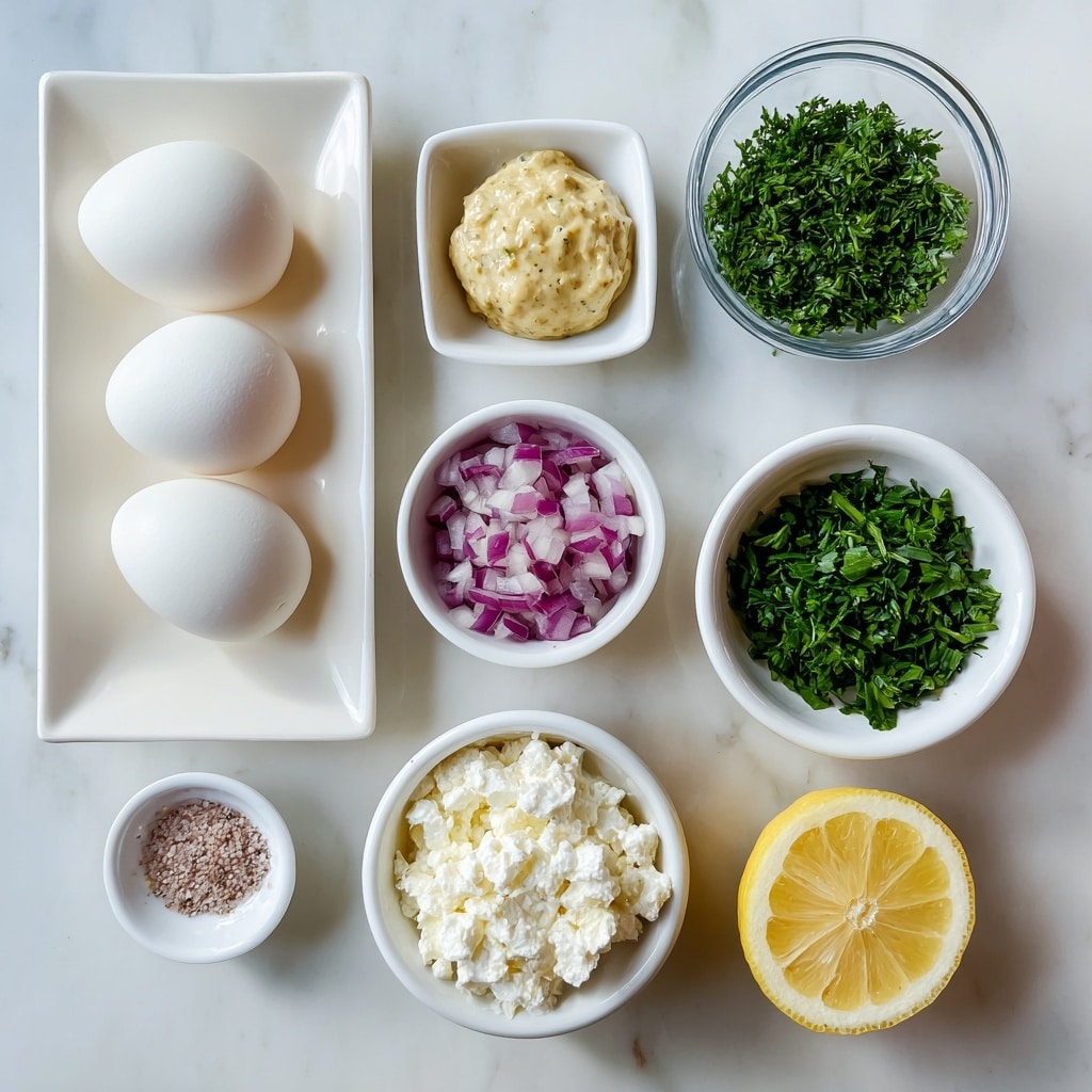 The image shows a top view of several small white bowls and a white rectangular plate arranged neatly on a white marbled surface. The plate on the left holds four whole peeled eggs, smooth and white. Above the plate is a small white bowl with grainy Dijon mustard, with a light yellow color. To the right of the mustard is a clear glass bowl filled with chopped green parsley, finely cut. Below the parsley bowl is a white bowl containing dark green chopped chives, dense and fresh. In the center is a small white bowl with finely diced red onion, showing white and purple colors. Below the onion is a white bowl with cottage cheese, creamy and soft-textured. A half lemon with visible seeds and juicy yellow flesh sits below the mustard bowl. In the bottom left is a small white dish with pink salt and black pepper mix. The ingredients are well spaced, each clearly visible and labeled. Photo taken with an iphone --ar 4:5 --v 7