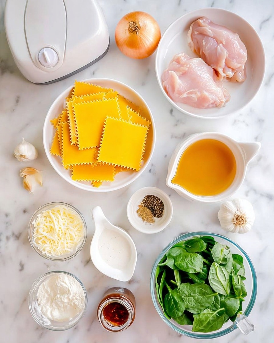 The image shows ingredients for cooking arranged neatly on a white marbled surface. In the top right, there is a white bowl with two pieces of raw pink chicken. Below that, a white bowl holds several bright yellow sheets of lasagna pasta, some with wavy edges. To the right, a clear glass bowl is filled with fresh green spinach leaves. At the bottom center, a small clear bowl contains shredded white cheese. Nearby, a small white bowl of white powder (likely flour) is visible. To the left, a small clear pitcher holds some white cream. Next to it, a larger clear pitcher contains an orange-colored broth. There is also a whole white onion, two garlic cloves in a white bowl, a small jar with a dark red sauce, and a small white bowl with mixed spices. A black pepper grinder and white salt container with a golden spoon are also present in the top left area. A white kitchen appliance is partially visible at the top left corner. The photo was taken with an iphone --ar 4:5 --v 7