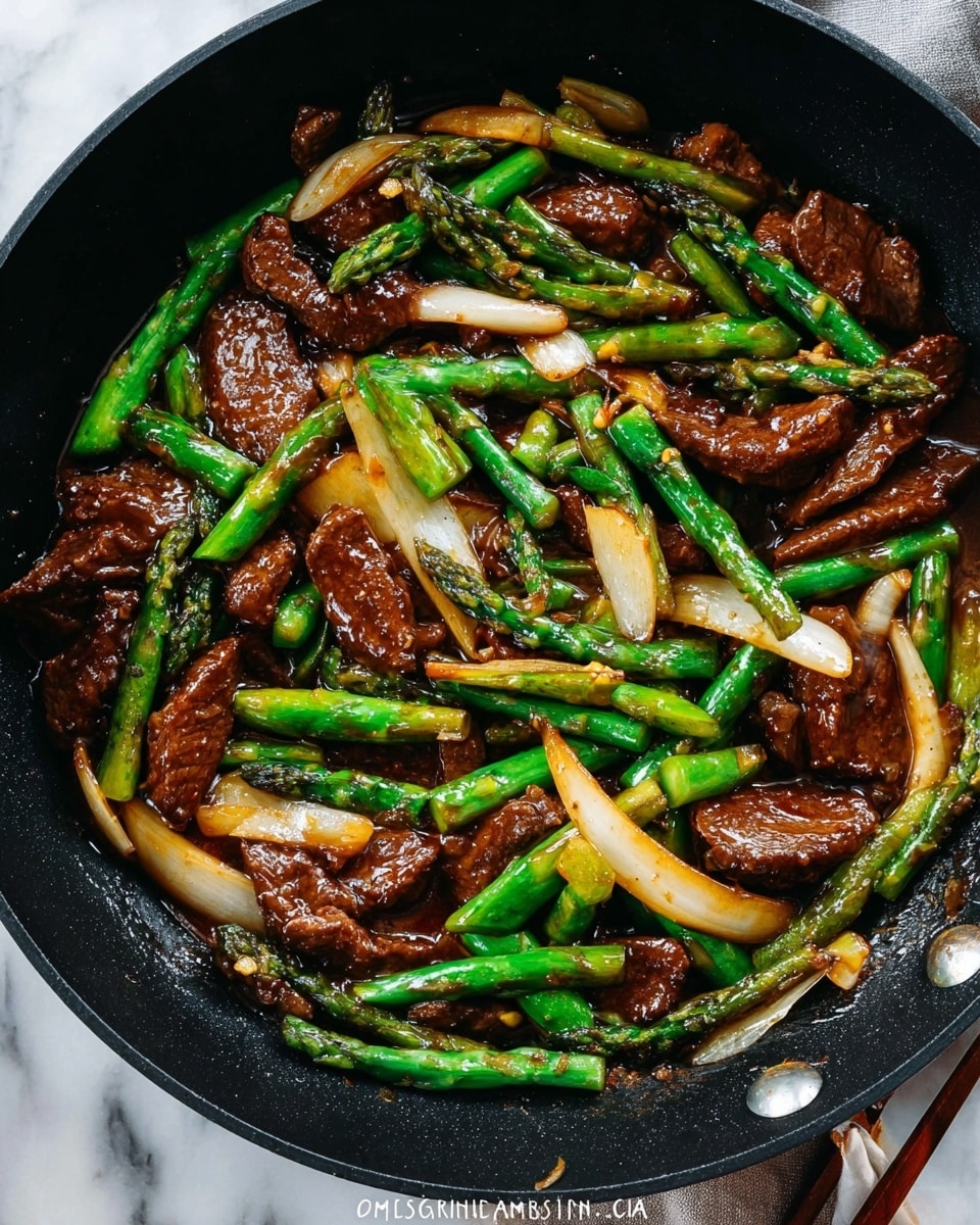 The image shows a black pan filled with a colorful stir-fry. The dish has three main layers: long, bright green asparagus stalks cut diagonally; curved white onion slices with a slight golden tint from cooking; and dark brown beef pieces coated in a glossy sauce. The vegetables and meat are mixed evenly across the pan. Thin slivers of garlic and ginger are scattered throughout, adding depth and texture. The pan is on a white marbled surface, with a woman's hand partially visible holding metal chopsticks near the bottom right corner. Photo taken with an iphone --ar 4:5 --v 7