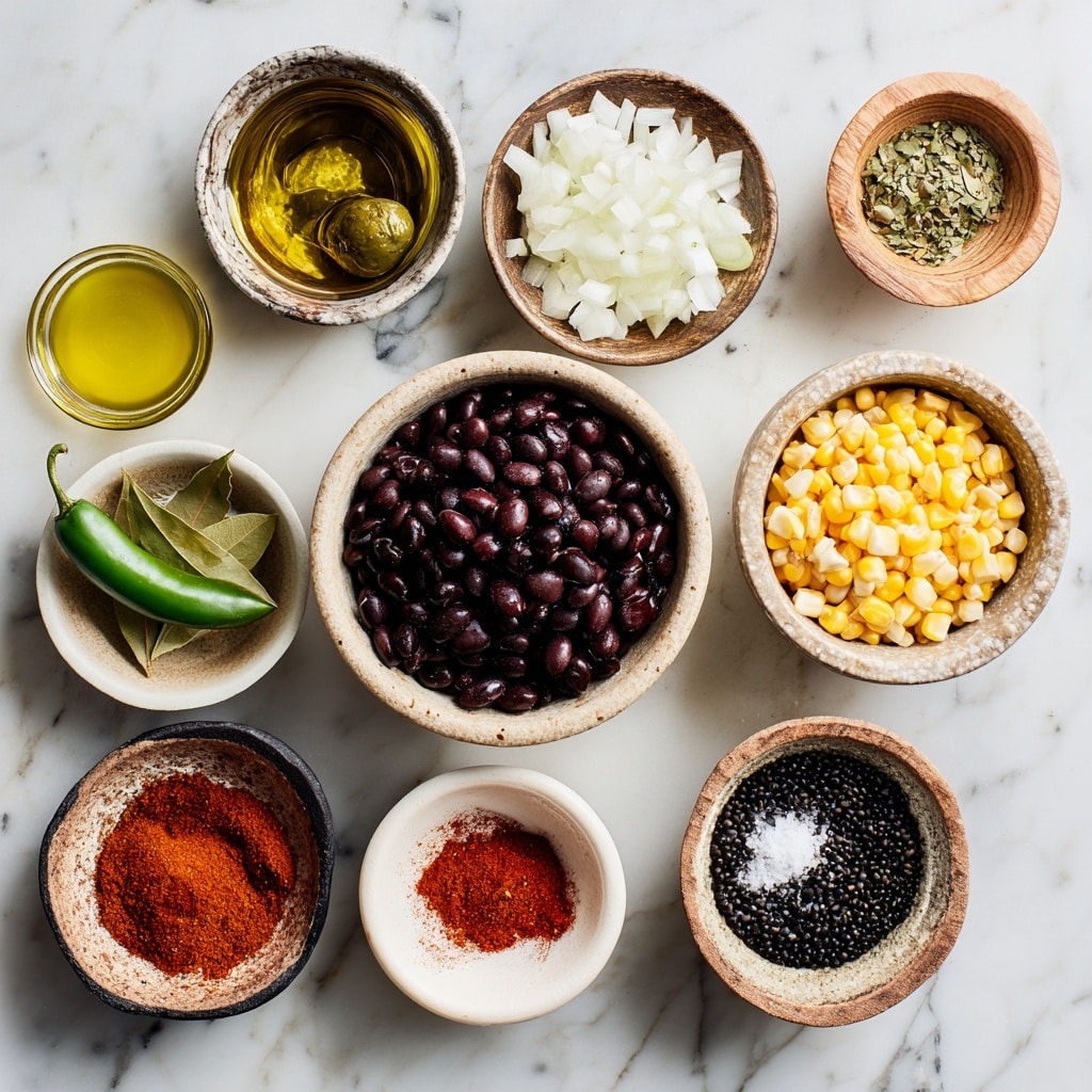 The image shows a close-up of a white bowl filled with a colorful mix of bright yellow corn kernels and black beans, with small bits of light brown cooked onion scattered throughout. Green cilantro leaves are placed on top for garnish, adding a fresh touch. In the top right corner of the bowl, there are two lime wedges resting on the edge. A dark-colored spoon is partially submerged on the right side of the bowl, ready to scoop some of the mixture. The bowl is set on a white marbled surface with a soft texture photo taken with an iphone --ar 4:5 --v 7