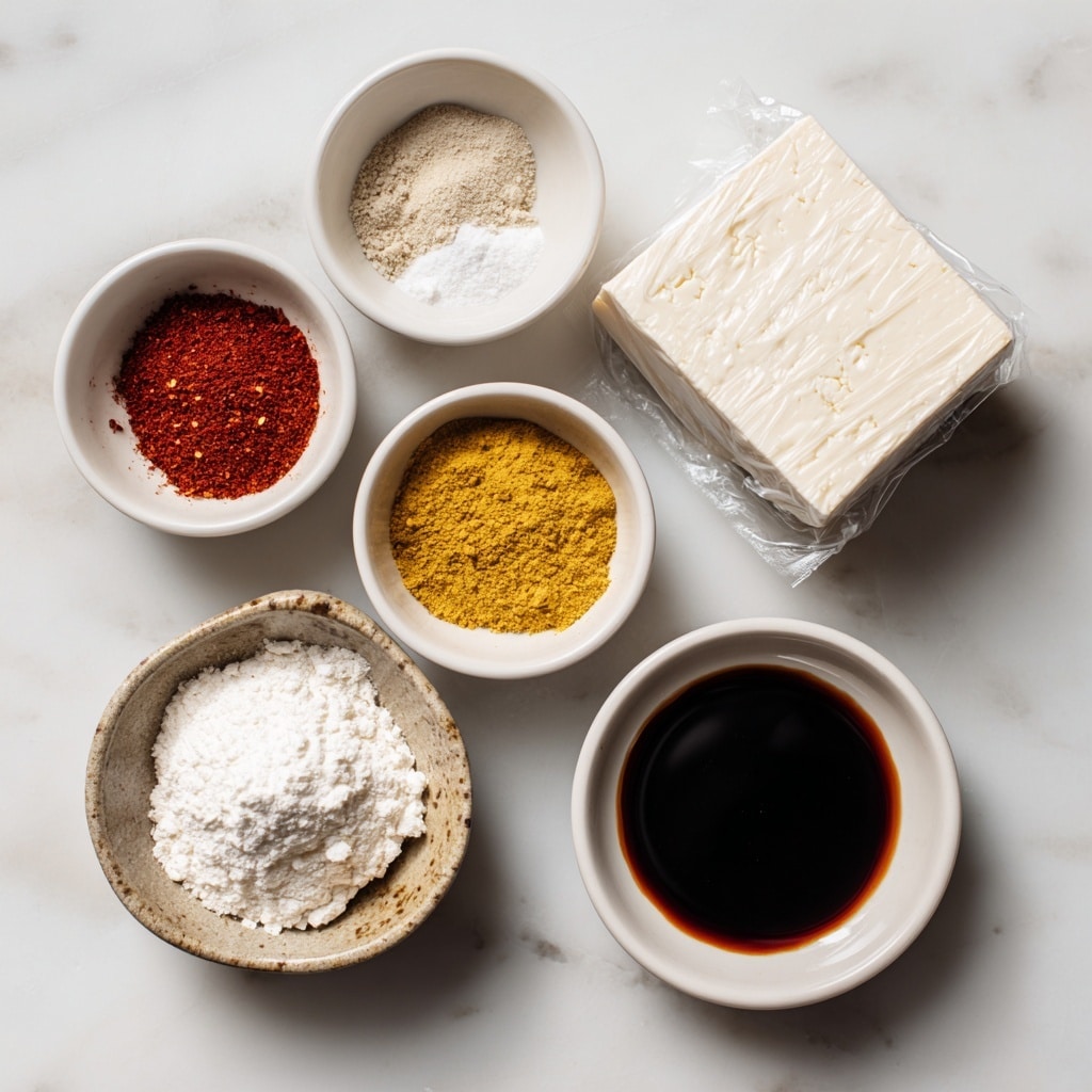 Five small white bowls with different ingredients are shown on a white marbled surface. The top left bowl contains red paprika, white garlic powder, onion powder, and salt in small separate piles. At the top right is a block of super firm tofu in clear plastic wrap resting on the surface. The middle right bowl holds yellow nutritional yeast. The bottom left bowl contains a white powder labeled cornstarch. The bottom middle bowl is filled with dark brown tamari sauce. The bowls and tofu are arranged loosely in a circular layout. Photo taken with an iphone --ar 4:5 --v 7