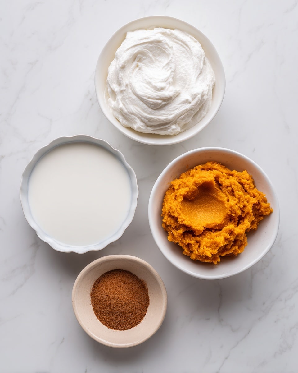 The image shows five white bowls and a paper packet arranged on a white marbled surface. At the top left, there is a white bowl filled with smooth, white whipped topping. To the right, a white bowl contains bright orange pumpkin puree with a slightly chunky texture. Below the pumpkin, there is a small white bowl holding brown pumpkin pie spice powder with a fine texture. At the bottom left, a white bowl filled with white milk is placed. Next to the milk bowl, a beige paper packet labeled as instant pudding is lying flat. The overall look is clean and simple with each ingredient clearly visible. photo taken with an iphone --ar 4:5 --v 7