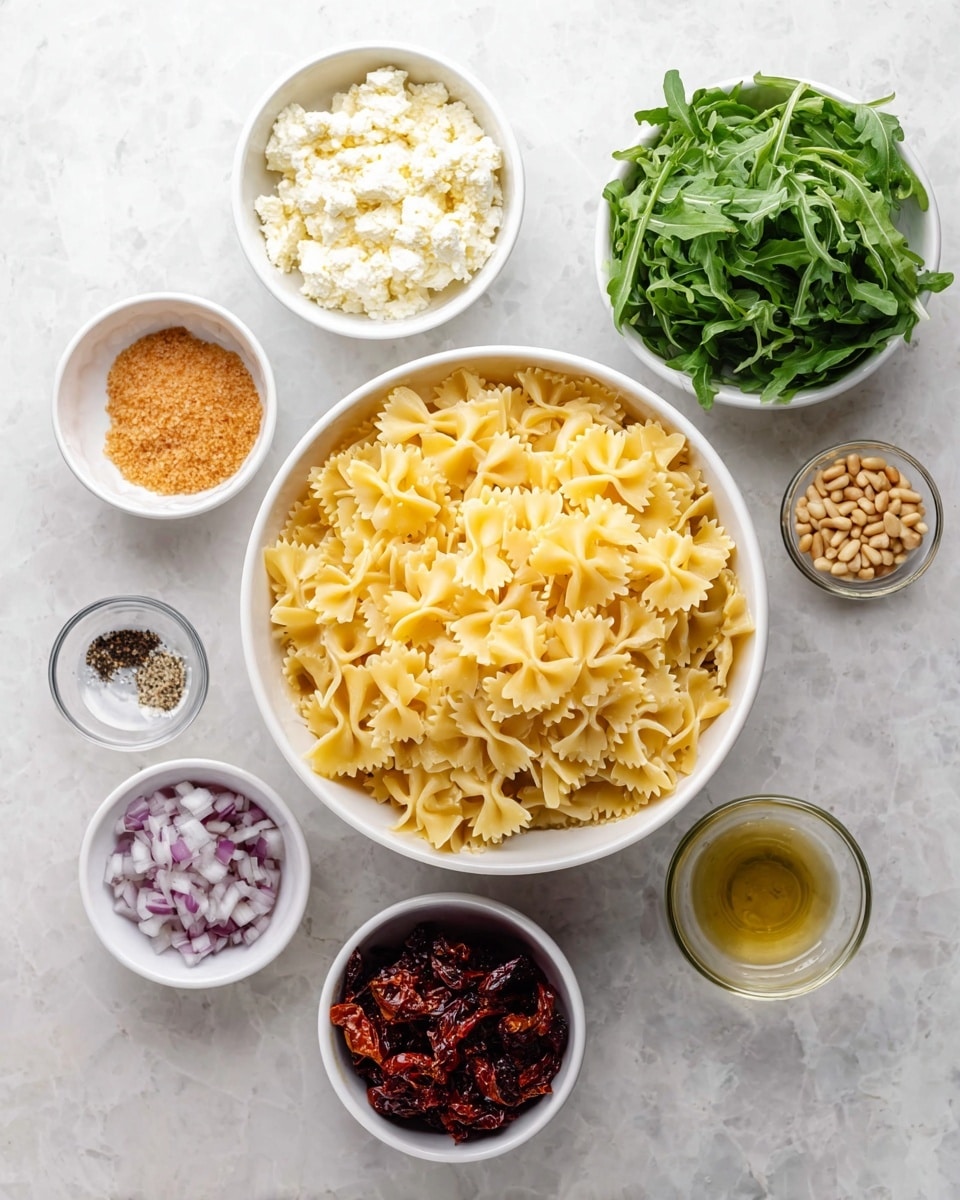 A top view of seven white bowls arranged on a white marbled surface, featuring ingredients for a pasta dish: the largest bowl in the center is full of uncooked farfalle pasta, surrounding it are six smaller bowls with various ingredients — a light brown bowl with a textured creamy cheese, a white bowl with finely chopped light purple shallots, a white bowl filled with dark red sun-dried tomatoes, a white bowl with coarse salt and black pepper, a small clear glass bowl of light beige pine nuts, and another white bowl holding fresh dark green arugula leaves, photo taken with an iphone --ar 4:5 --v 7
