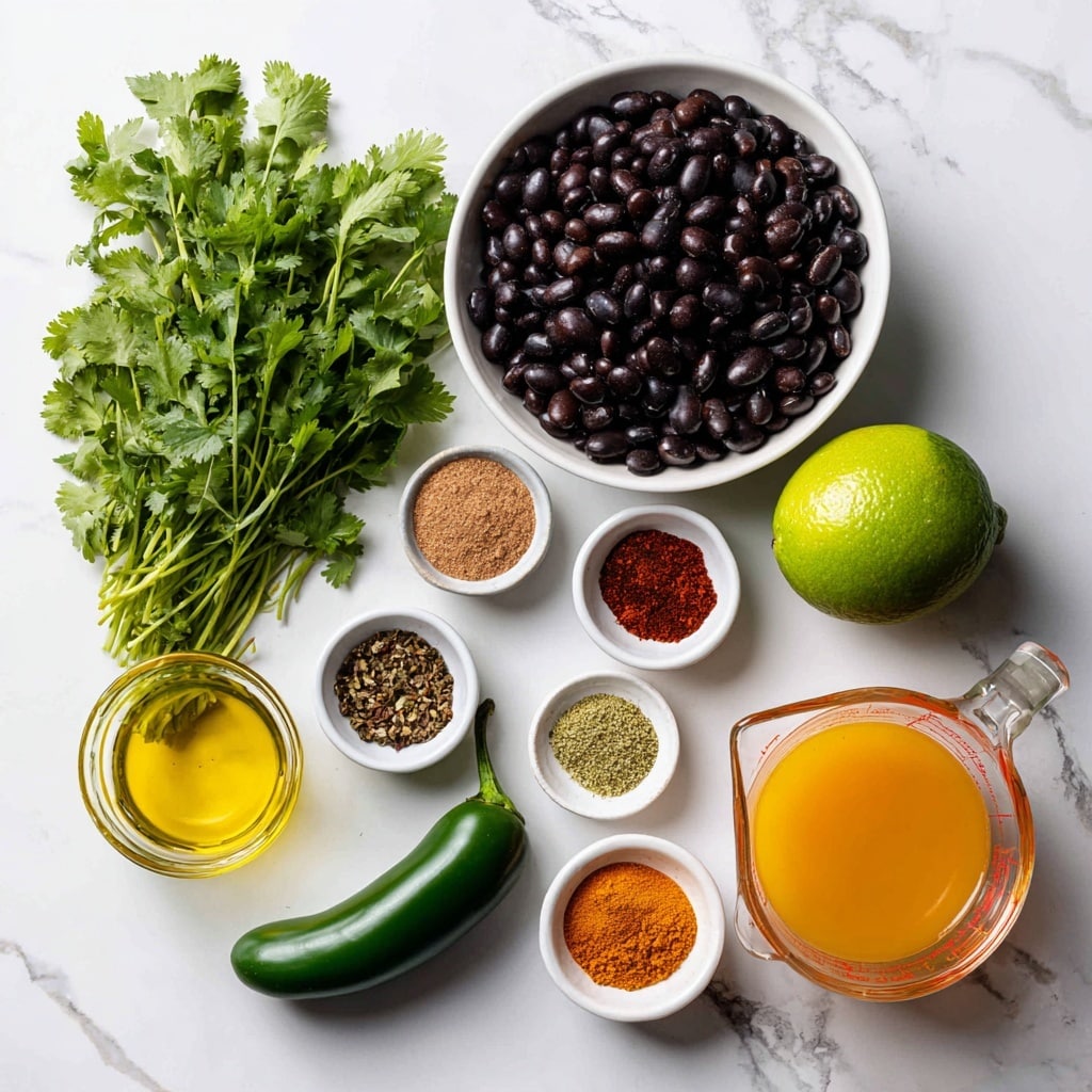 The image shows several ingredients laid out on a white marbled surface. A white bowl filled with shiny black beans is at the top center. Below it, a bunch of green cilantro with leafy stems is positioned to the left. A whole green lime and a green jalapeño are placed side by side below the cilantro. To the right of the jalapeño and lime, a white bowl is filled with six different spices, each in a small colored pile, including red, brown, green, orange, and light pink shades. Below the spice bowl, there is a clear glass measuring cup with bright orange veggie broth. To the left of the measuring cup, a small white bowl holds golden yellow oil. The ingredients are spaced out neatly on the white marbled background. photo taken with an iphone --ar 4:5 --v 7
