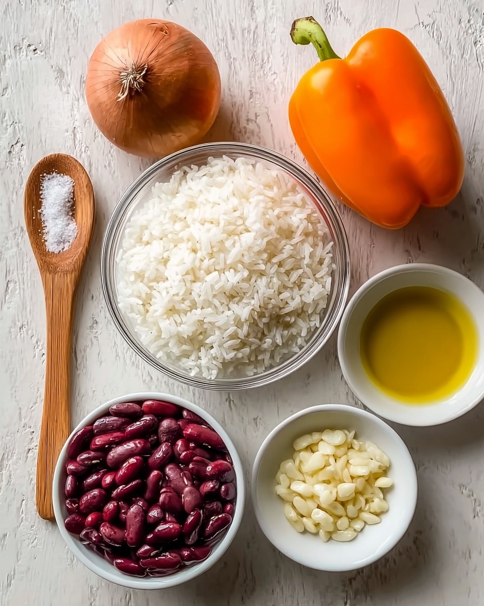 A top-down view of six separate items arranged on a white marbled surface: a whole brown onion in the top left, a bright orange bell pepper in the top right, a wooden spoon with coarse salt to the left center, a clear glass bowl filled with fluffy white cooked rice in the center, a white bowl with dark red kidney beans in the bottom left, a small white bowl with minced garlic in the middle right, and a small white bowl filled with yellow olive oil in the bottom right. Each item is distinct with clear texture and rich colors, lit softly to show natural details photo taken with an iphone --ar 4:5 --v 7