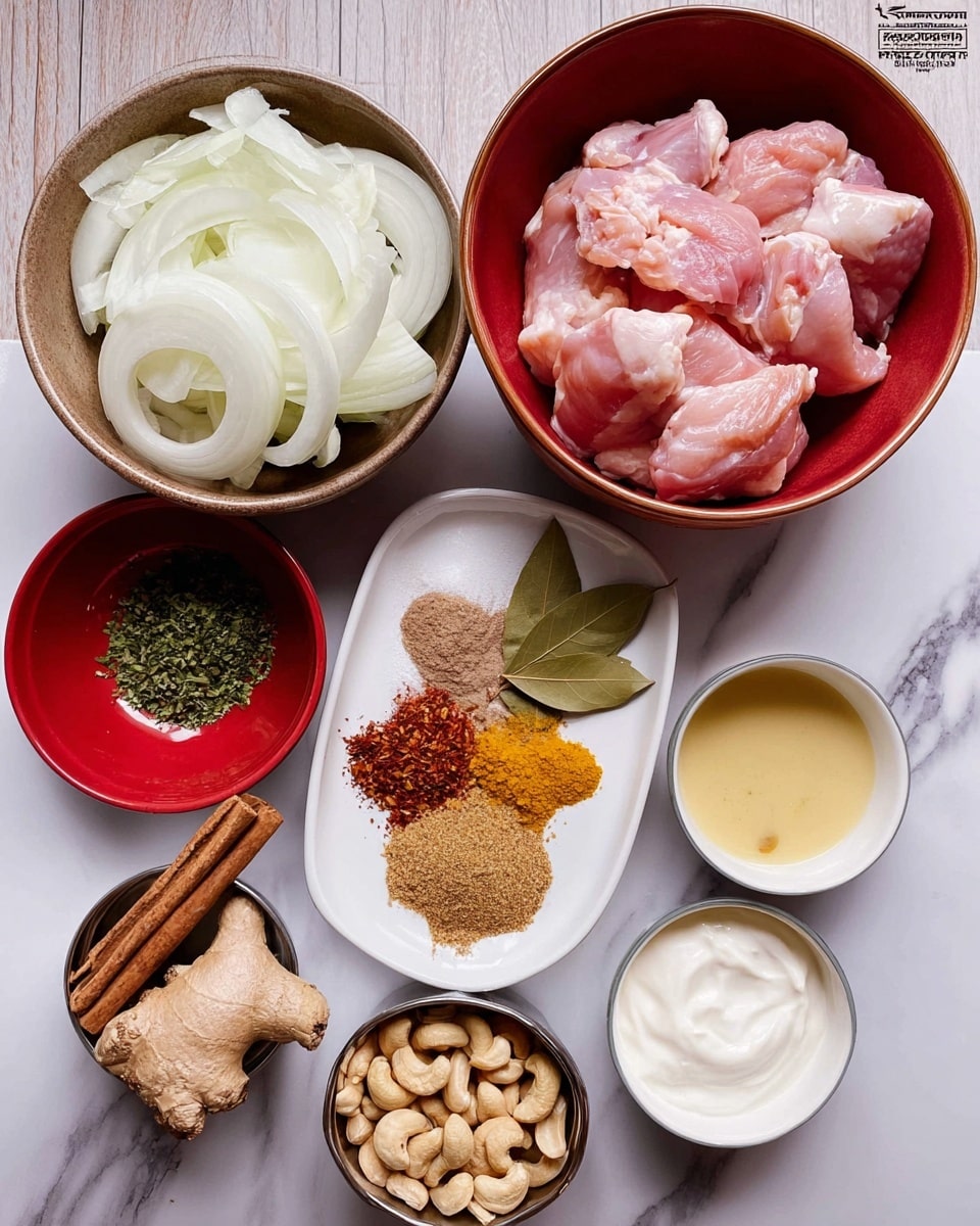 The image shows six bowls of ingredients placed on a white marbled surface. At the top center is a bowl filled with raw pink chicken pieces. To the left, there is a bowl full of thinly sliced white onions. Below the onions, a red bowl holds chopped green herbs, brown powder, and white salt. In the center, a white plate displays piles of brown, red, and yellow powdered spices along with whole cardamom pods, cloves, a cinnamon stick, and two bay leaves. To the right of the plate, a small white bowl contains a light yellow paste. Below it, another white bowl is filled with creamy white yogurt. In front, a small metal container holds whole cashew nuts. photo taken with an iphone --ar 4:5 --v 7