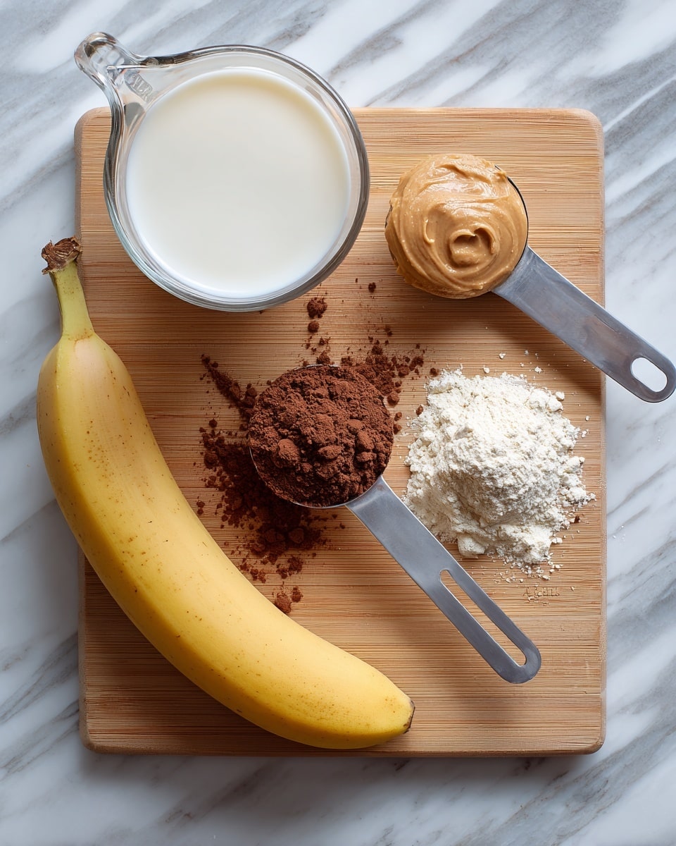 The image shows a light wooden cutting board on a white marbled surface with five ingredients neatly placed on top. At the top left corner, there is a clear glass measuring cup filled with white milk. To the right of the cup, a metal tablespoon holds a smooth, light-brown scoop of peanut butter. Below the peanut butter, a white plastic scoop contains fine white protein powder. Centered below these is a metal spoon holding dark brown cocoa powder, with some powder spilled around it. At the bottom left corner, a whole ripe yellow banana lies diagonally on the board. Each ingredient is labeled in simple white text. photo taken with an iphone --ar 4:5 --v 7