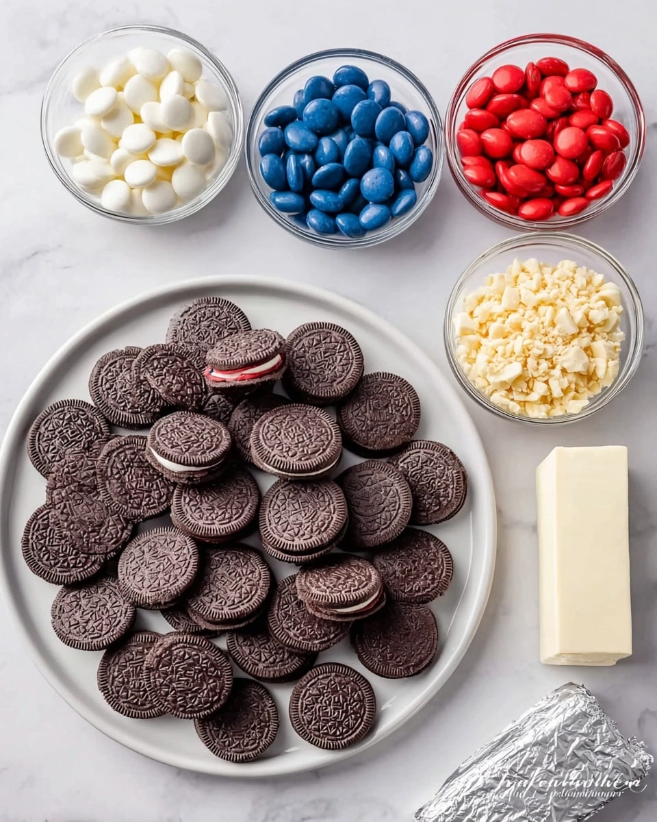 The image shows a white plate filled with dark brown sandwich cookies, arranged close to each other in neat rows. Around the plate are five small clear glass bowls, each containing different colored round candy melts: white, deep blue, bright red, and a bowl of light beige crushed nuts. There is also a silver wrapped block of cream cheese near the bottom right. All items are placed on a white marbled surface, with light and shadows making the colors and textures clear. photo taken with an iphone --ar 4:5 --v 7
