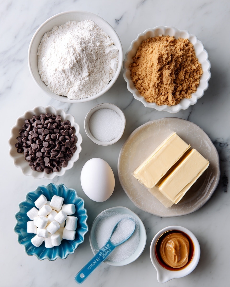 The image shows a top-down view of several small white bowls and a light gray plate arranged on a white marbled surface. The largest white bowl at the top left contains a mix of white flour, baking soda, and salt with a powdery texture. To its right, a smaller white bowl holds light brown, crumbly brown sugar. Below the flour bowl and to the left, a scalloped white bowl is filled with dark brown chocolate chips clustered together. Just below the brown sugar, a light gray plate displays several rectangular chunks of pale yellow butter. In the center, a small plain white bowl contains white granulated sugar with a fine texture. Below the sugar, a scalloped white bowl holds one whole white egg. To the bottom left, a blue measuring cup is filled with small white mini marshmallows. On the bottom right, a small white bowl holds dark amber vanilla extract, and next to it, a blue measuring spoon contains smooth, light brown peanut butter with slight swirls. All the ingredients are neatly spaced out. Photo taken with an iphone --ar 4:5 --v 7