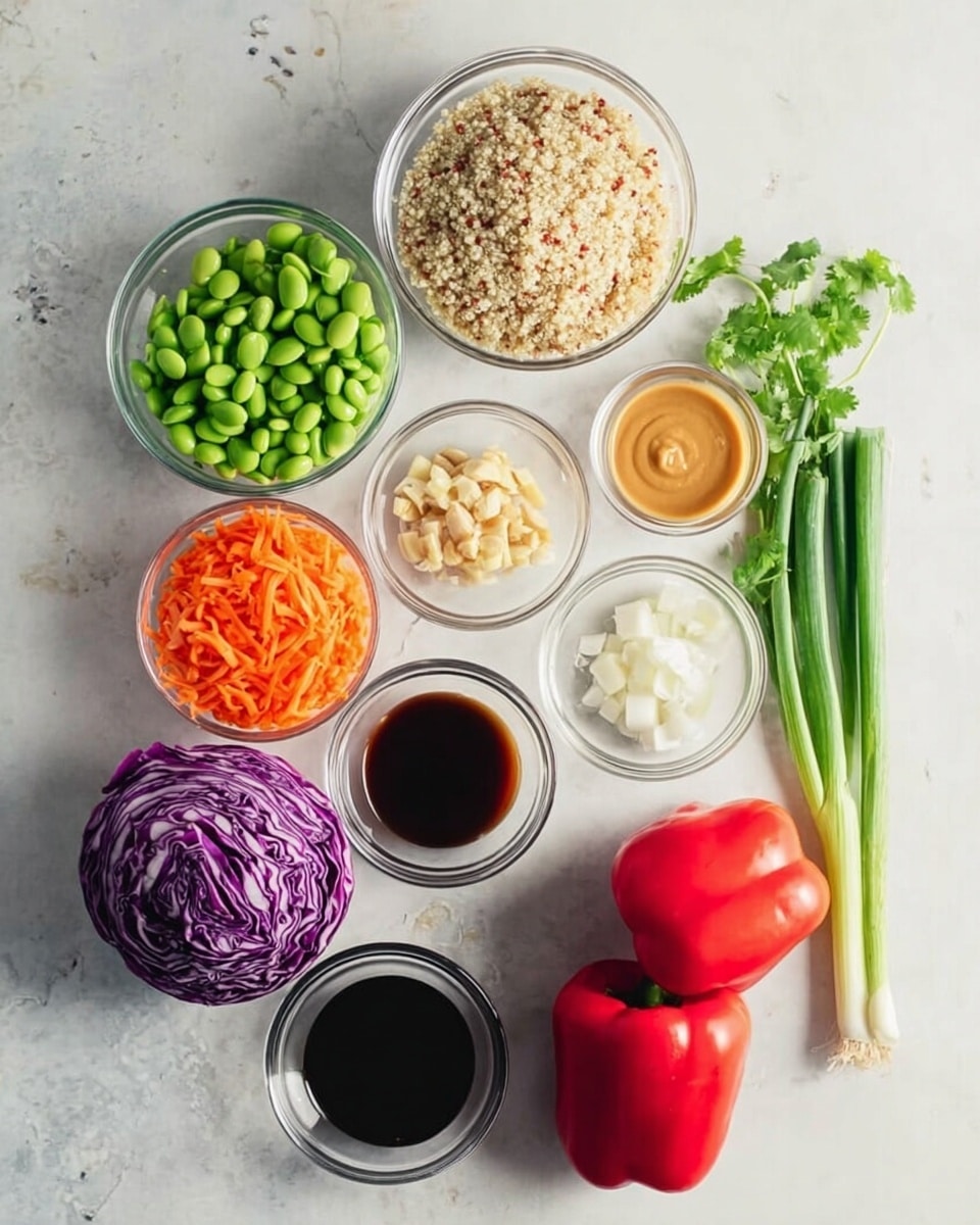 The image shows a white marbled surface with various clear glass bowls and fresh vegetables arranged neatly. In the center, there is a bowl of mixed white and red quinoa. Around it, there are bowls of bright green edamame beans, shredded orange carrots, creamy peanut sauce of light brown color, and small bowls with diced garlic, white minced ginger, white granulated sugar, soy sauce, and dark brown liquid, likely vinegar or sesame oil. On the surface, there is a vibrant purple half cabbage, a small whole red onion, fresh green scallions, sprigs of fresh cilantro, and two whole red bell peppers. The colors are bright and fresh, creating a balanced and clean layout. photo taken with an iphone --ar 4:5 --v 7