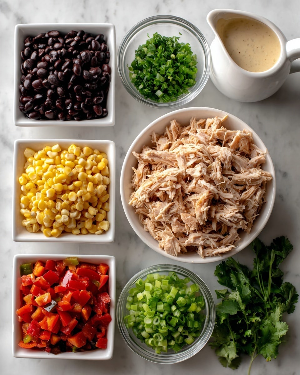 A close-up view of a creamy salad in a white bowl placed on a white marbled surface, showing a mix with three main layers: the base is shredded light beige chicken, the second layer is a creamy white sauce covering the chicken, and the top layer includes bright yellow corn kernels, small pieces of dark black beans, diced red tomatoes, and chopped green bell peppers, all mixed evenly together. The textures show softness from the shredded chicken and creaminess from the sauce, contrasted with the crisp, fresh look of the vegetables. Around the bowl on the white marbled surface, there are a few round yellow tortilla chips slightly visible. Photo taken with an iphone --ar 4:5 --v 7