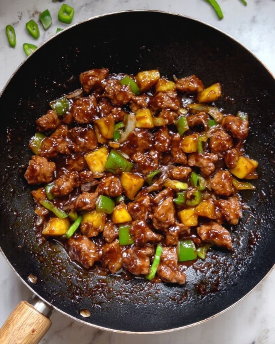 A black wok with a wooden handle holds a stir-fry dish with small pieces of brown meat, glossy dark brown sauce coating each piece. There are chunks of light yellow pineapple and green bell pepper mixed in, adding bright color contrast. The wok sits on a white marbled surface with a few small green bell pepper pieces scattered around. photo taken with an iphone --ar 4:5 --v 7