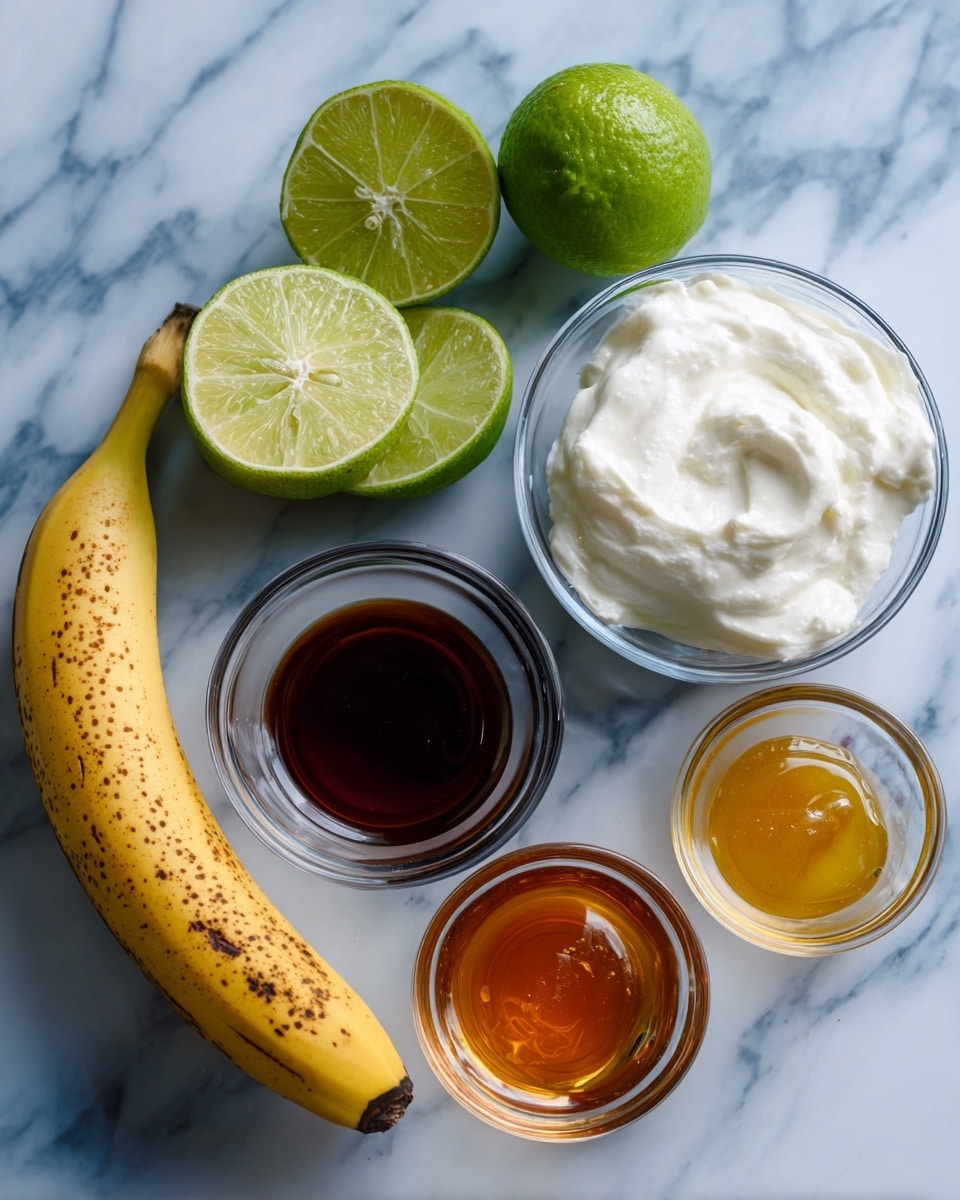 The image shows ingredients laid out on a white marbled surface with a blue overlay, including a whole banana at the bottom left, a whole lime and a lime half above it, a bowl of white creamy yogurt at the top right, a small glass bowl with dark brown vanilla extract below the yogurt, and another small glass bowl with golden honey below the vanilla. The labels for each ingredient appear in black text on white rectangular tags positioned near the items. photo taken with an iphone --ar 4:5 --v 7